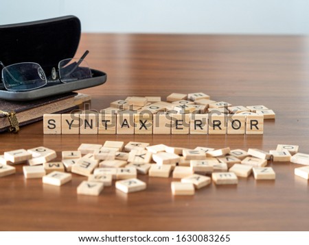 syntax error concept represented by wooden letter tiles