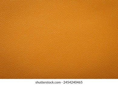 Synthetic leather brown background texture. Brown leather textured background.