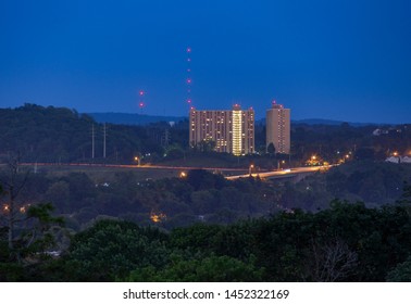 SYRACUSE, NEW YORK - JULY 13, 2019: View Of Syracuse Downtown Skyline At Night.