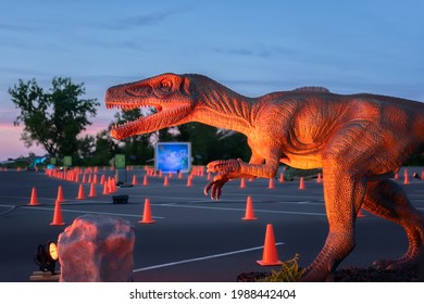 Syracuse, New York - May 23, 2021: Night Profile View Of A Velociraptor Dromaeosauridae Dinosaur.