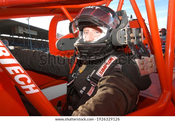
Syracuse, NY, USA - October 10, 2015: 
Driver Kenny Tremont waits to compete in the final Super Dirt Week
championship stock car races held at the historic Syracuse
Fairgrounds dirt
track.				