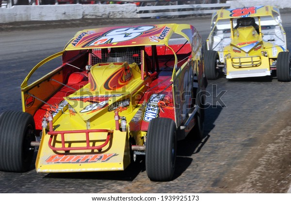 \
Syracuse, NY, USA - October 11, 2015: \
Vic Coffey leads Frank Cozze during the final Super Dirt Week\
championship stock car races at the historic Syracuse Fairgrounds\
dirt track.				
