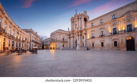 Syracuse, Sicily, Italy. Cityscape image of historical centre of Syracuse, Sicily, Italy with old square and Syracuse Cathedral at sunrise. - Shutterstock ID 2293959403