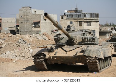 Syria, Damascus, September 2013. Tank Syrian National Army Is Close To A War Zone In The City Of Damascus.