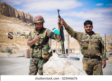 SYRIA, MAALULA - SEPTEMBER 2013. The Soldiers Of The Syrian National Army At The Gates Of The City Ma'loula. Ma'loula Became A Place Of Fighting Between Assad Forces And The Rebels.