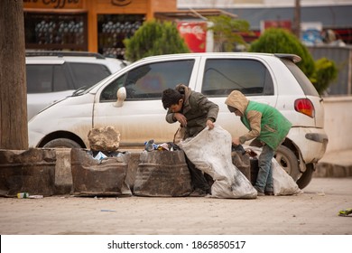 Syria, November 27, 2020: Children Collecting Garbage In Syria