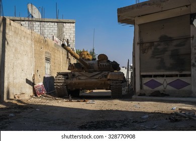 SYRIA, SHABAA, SEPTEMBER 2013. Tank Syrian National Army Stands Between The Buildings In The Suburbs Of Damascus, After The Battles With Rebels.