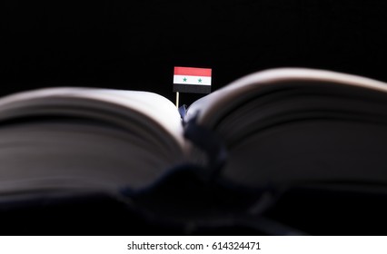 Syrian Flag In The Middle Of The Book. Knowledge And Education Concept.