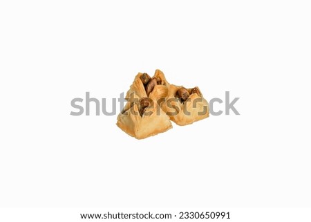 Syrian Turkish sweet (Baklawa dough shaped as a small bag) isolated on white background