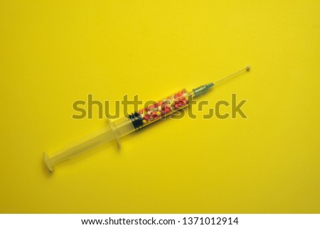 Similar – Medical syringe on colorful background.