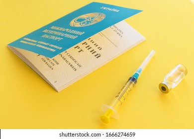 Syringe, Glass Vial With Liquid And Ukrainian Animal Passport For Indicating Vaccinations And Microchip Number. International Veterinary Certificate.  Cat Or Dog Document ID. Health Care And Medicine.