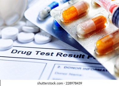 Syringe with glass vials and medications pills drug test report