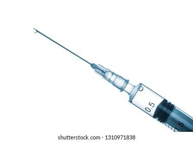 A syringe with an injection solution on white background with copy space. Syringe with vaccination. Liquid medication or drug. - Shutterstock ID 1310971838