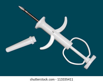 Syringe for the introduction of chip - Shutterstock ID 113335411