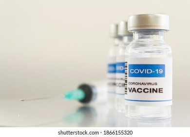 Syringe and laboratory Injection Vial with Covid-19 coronavirus vaccine