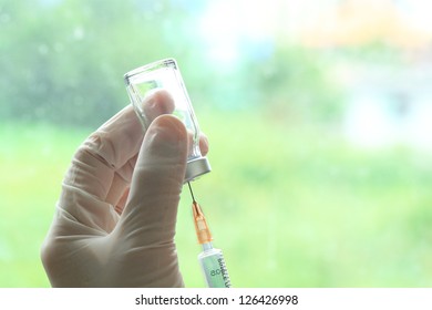 Syringe with a liquid for injection
