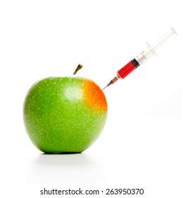 A Syringe On A GMO, Trangenic, Apple
