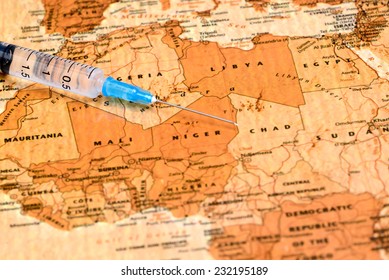 Syringe On A Map Of Africa 