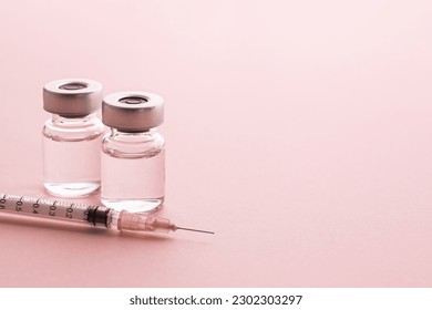 
Syringe and vial on pink background. Image of cosmetic medicine and cosmetic surgery. - Powered by Shutterstock