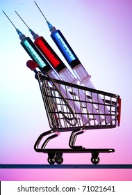 Syringes In A Miniature Shopping Cart