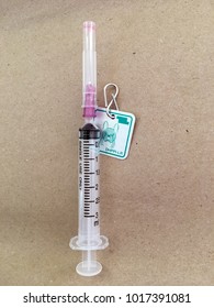 Syringes And Needles On Rabies Tag, Vertical