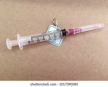 Syringes And Needles On Rabies Tag,horizontal