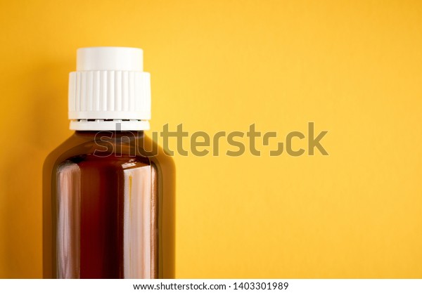 Download Syrup Glass Bottle Composition On Yellow Stock Photo Edit Now 1403301989 Yellowimages Mockups