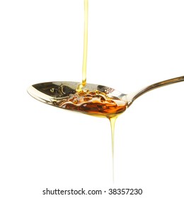 Syrup Pouring Into Desert Spoon Isolated Stock Photo (Edit Now) 38357230