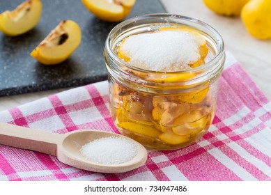 Syrup Of Quince On Fresh Fruits Background.