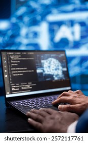 System administrator analyzing complex AI brain models on laptop. Close up shot of worker using machine learning on notebook device to develop artificial intelligence technology