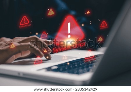 System error alert concept with warning icons on laptop screen, cybersecurity risk, software failure, network problem, digital security monitoring and information technology support.