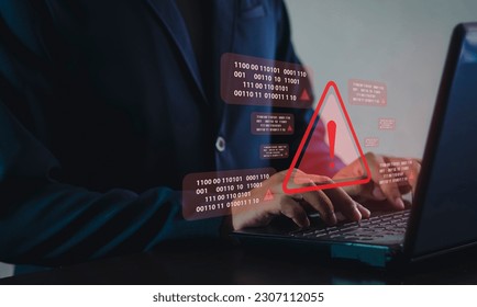 System hacked alert on computer screen after cyber attack on network. Cybersecurity vulnerability on internet, virus, data breach, malicious connection. business people at work.