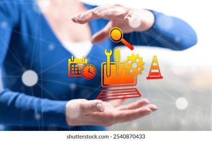 System maintenance concept between hands of a woman in background