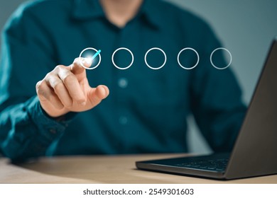 system, mark, checklist, checkmark, advice, analyze, marketing, opportunity, scan, tick. A man is pointing at a laptop screen with a thumbs up symbol.
