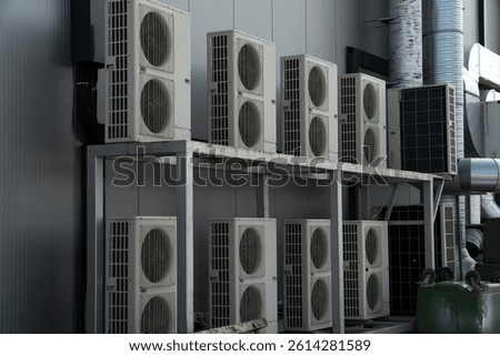 A system of multiple air conditioners cooling the restaurant building