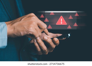 System warning alert on a virtual interface with hand interaction, showing cybersecurity risks, data breaches, malware threats, hacking attempts, and digital system vulnerability in modern technology.
