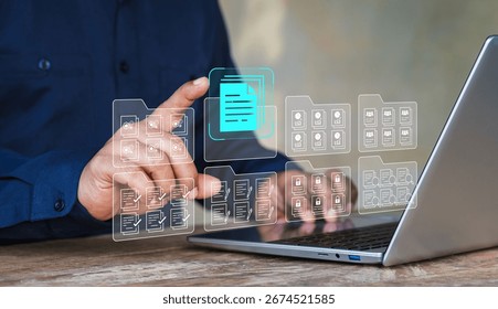 Systematic data storage, Folder hierarchy structure, Document management system DMS, Saving and classifying files, Digital file, Storage secure, Businessman selecting files on cloud and using laptop