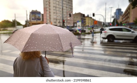 Szczecin, Poland. 29 August 2022. People With Umbrellas On A Rainy Day Outside