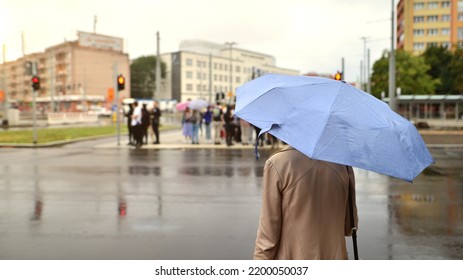 Szczecin, Poland. 29 August 2022. People With Umbrellas On A Rainy Day Outside