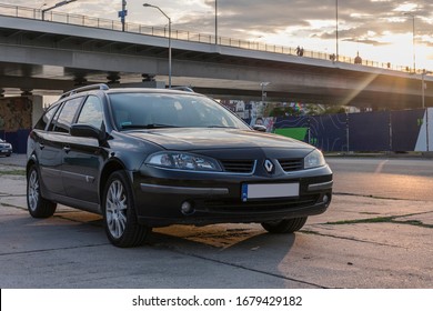 Szczecin, Poland - 8.08.2019: Black Middle Class Car Renault Laguna II Ph II 2005 After Lifting At Sunrise