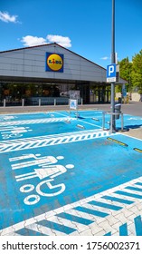 Szczecin, Poland - June 14, 2020: Empty Parking Lot With Family Space In Front Of Lidl Grocery Store.