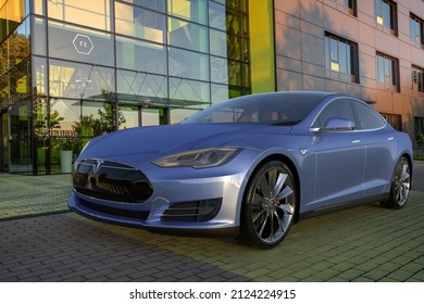 Szczecin,Poland-January 2022:Tesla Model S parked in front of a modern building