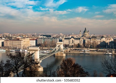 The Szechenyi Chain Bridge is a suspension bridge that spans the River Danube between Buda and Pest, the western and eastern sides of Budapest, the capital of Hungary. - Shutterstock ID 535683352