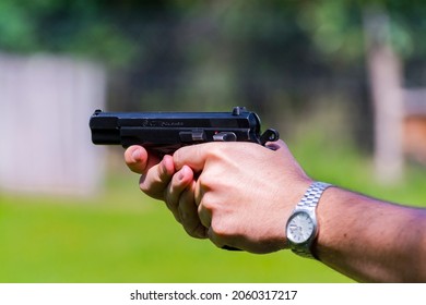 SZEGED, HUNGARY - JUNE 19. 2016: CZ 75 CAL 9mm Luger semi-automatic pistol shooting