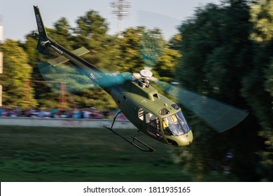 Szolnok / Hungary - August 20, 2019: Hungarian Air Force Airbus Helicopters Eurocopter AS350 H125M Ecureuil 102 military helicopter flying over Szolnok city downtown