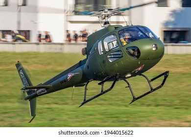 Szolnok, Hungary - August 20, 2019: Hungarian Air Force Airbus Helicopters Eurocopter AS350 H125M Ecureuil 102 military helicopter flying over Szolnok city downtown