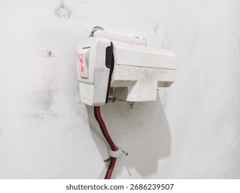 A T connector is an electrical binding post consisting of three posts forming the three arms of a letter T. It is used to join three wires together, with two wires in line and the third wire joining t