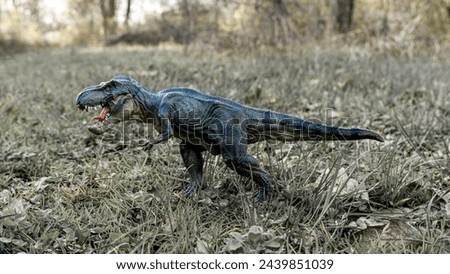 T Rex Dinosaur monstrous animal with sharp teeth standing in the forest