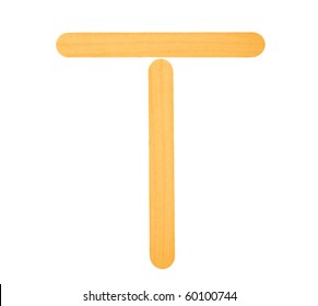 T- Tongue Depressor On A White Background