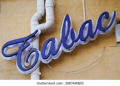 tabac text blue sign text shop of French store means authorized tobacco dealer in france